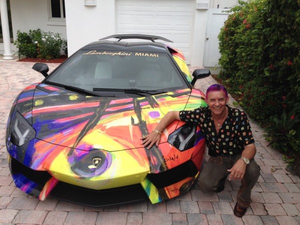 Duaiv sent Park West Gallery this photo of him at home with the Lamborghini Aventador Roadster.