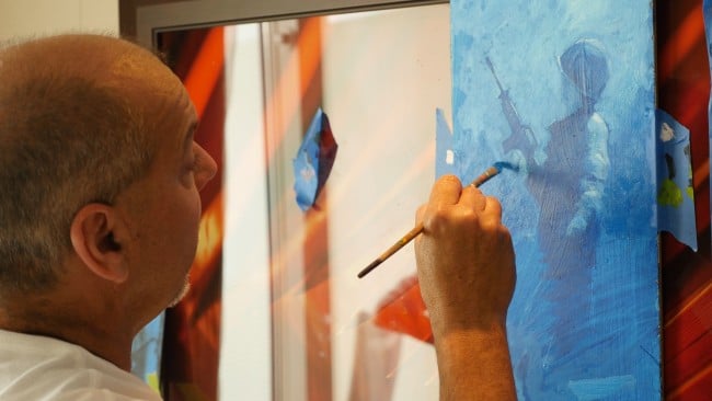 Marko Mavrovich painting in stateroom - Park West Gallery
