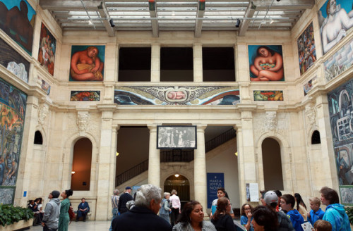 Diego Rivera begins the narrative of his murals depicting North and South America as women and native Michigan produce below them. Photo courtesy of The New York Times.