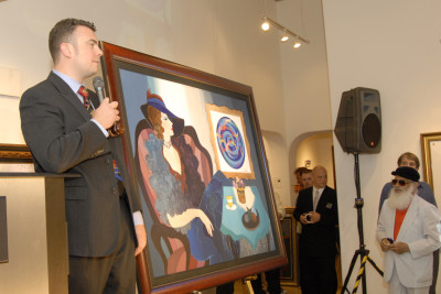Rob auctioning at a special event featuring artist Yaacov Agam. Photo credit: Brent Plaxton 