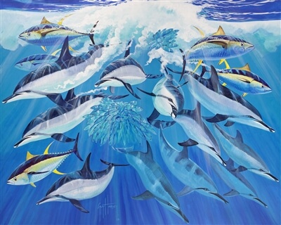 A Guy Harvey dye sublimation painting of dolphins and tuna feeding on anchovies
