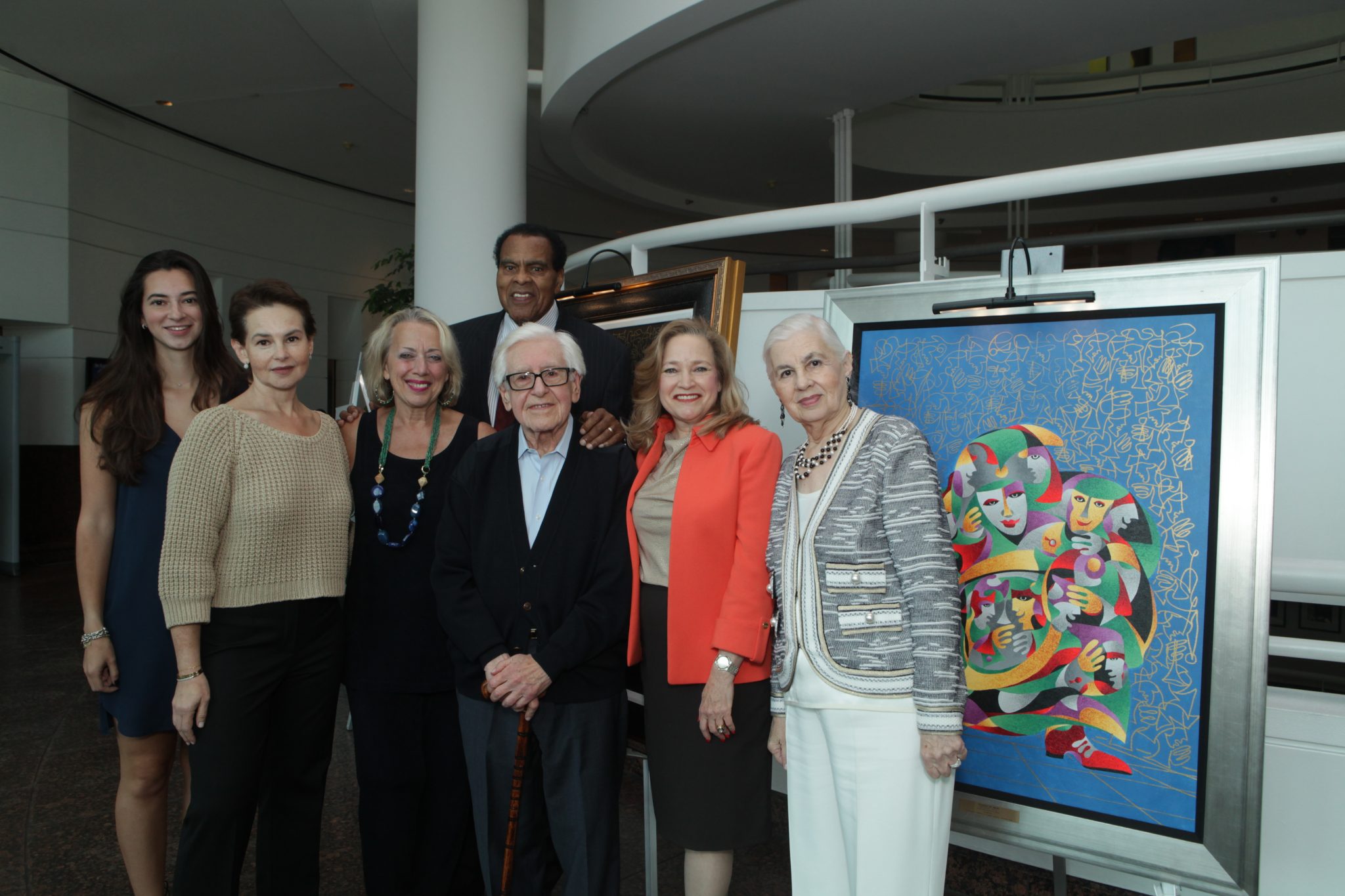 Anatole Krasnyansky poses with family and former NBA star Tommy Hawkins at the Museum of Tolerance.