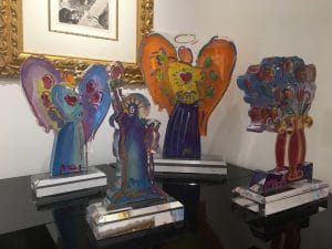 These acrylic sculptures by Peter Max would be ideal candidates for a lighted pedestal.
