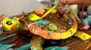 Patinas are hand-painted into the sculptures and then cooked on with a blowtorch. 