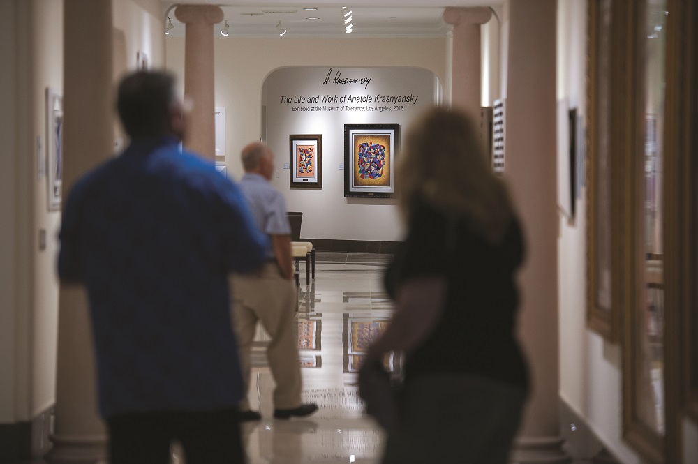 Guests browse the galleries at Park West Museum.