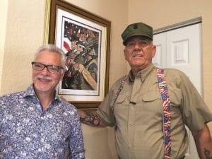 Park West Gallery Director Morry Shapiro and retired United State Marine Corps Staff Sergeant, R. Lee Ermey with artwork by Norman Rockwell.
