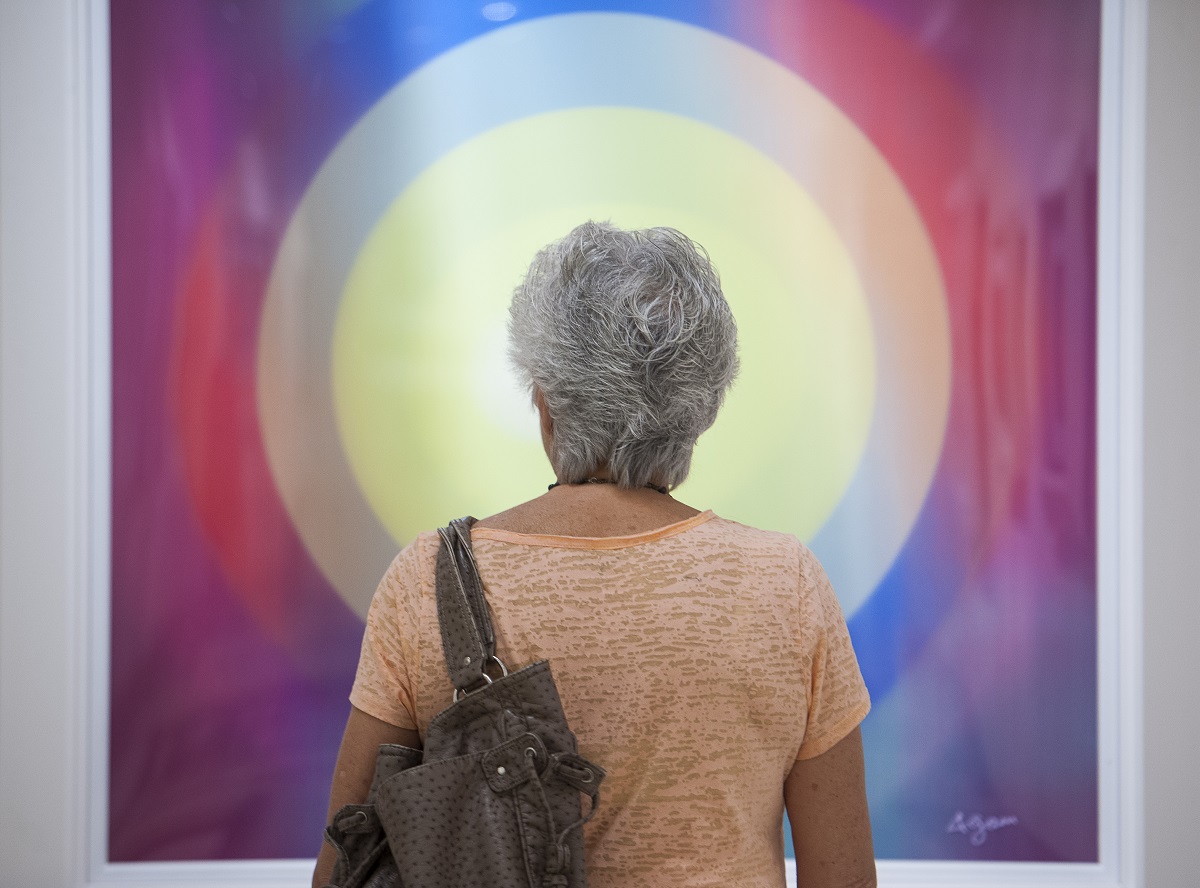 VIP guest studies a Yaacov Agam work at the opening of the renovated Park West Museum, 2017, Year of Art.