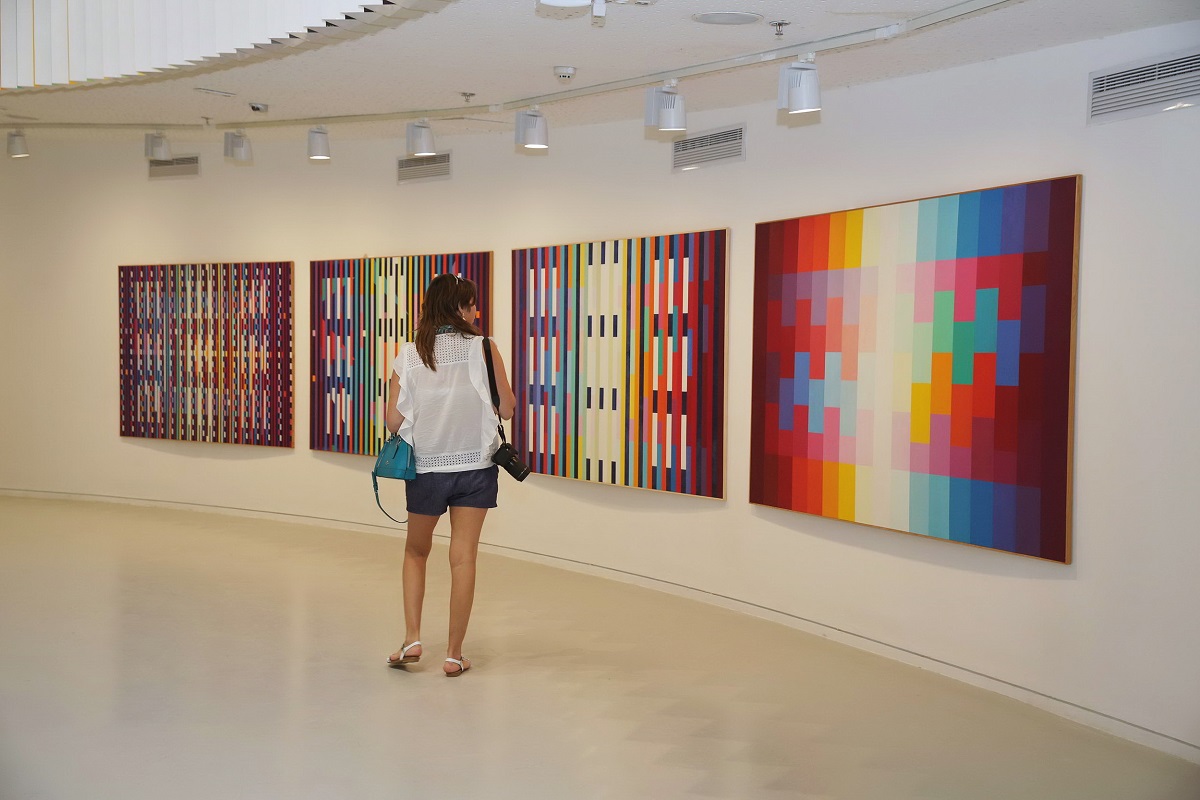Park West Gallery guest browses the collection at the opening of the Yaacov Agam Museum of Art in Israel, 2017, Year of Art.
