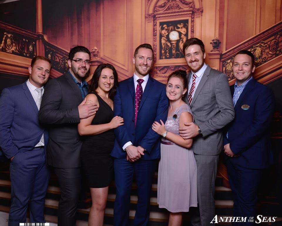 Carolyn and Christopher posing with the Park West Art Team on board Royal Caribbean International’s Anthem of the Seas.