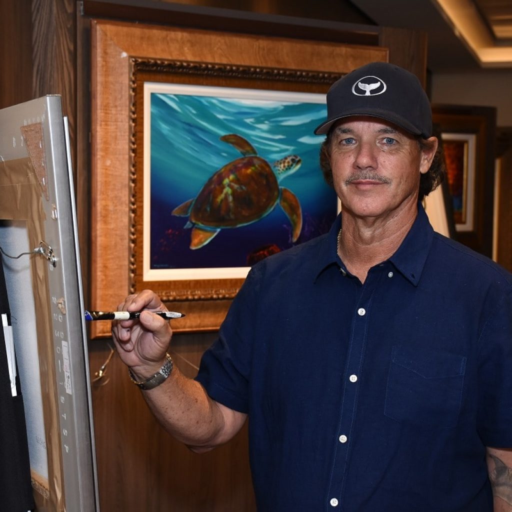 Wyland painting on board Norwegian Bliss, 2018. Wyland art