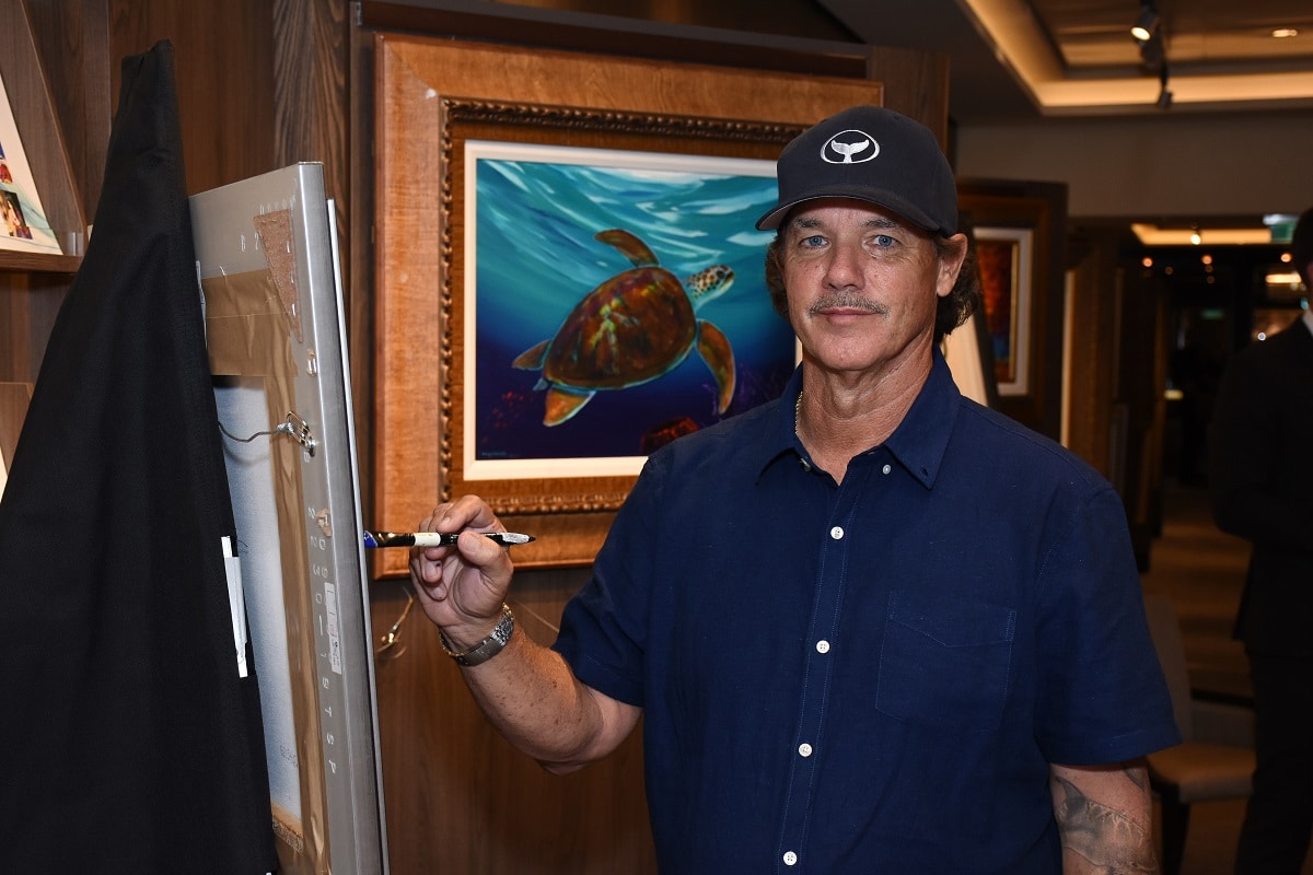 Wyland painting on board Norwegian Bliss, 2018. Wyland art