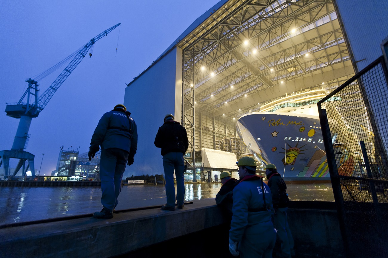 NCL Breakaway—a.k.a. the Peter Max cruise ship—prepares to leave the Meyer Werft shipyard in 2013. (Image courtesy of Meyer Werft)