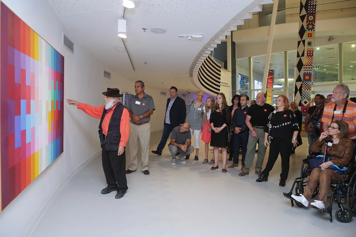 Agam gives guests a personal tour at the Yaacov Agam Museum of Art in 2017.