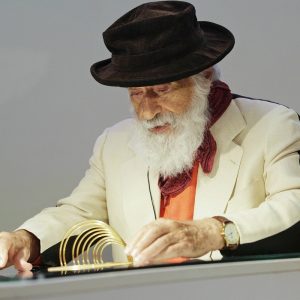 Yaacov Agam discusses art history with Park West Gallery VIP guests at the opening of the Yaacov Agam Museum of Art in Rishon LeZion, Israel.