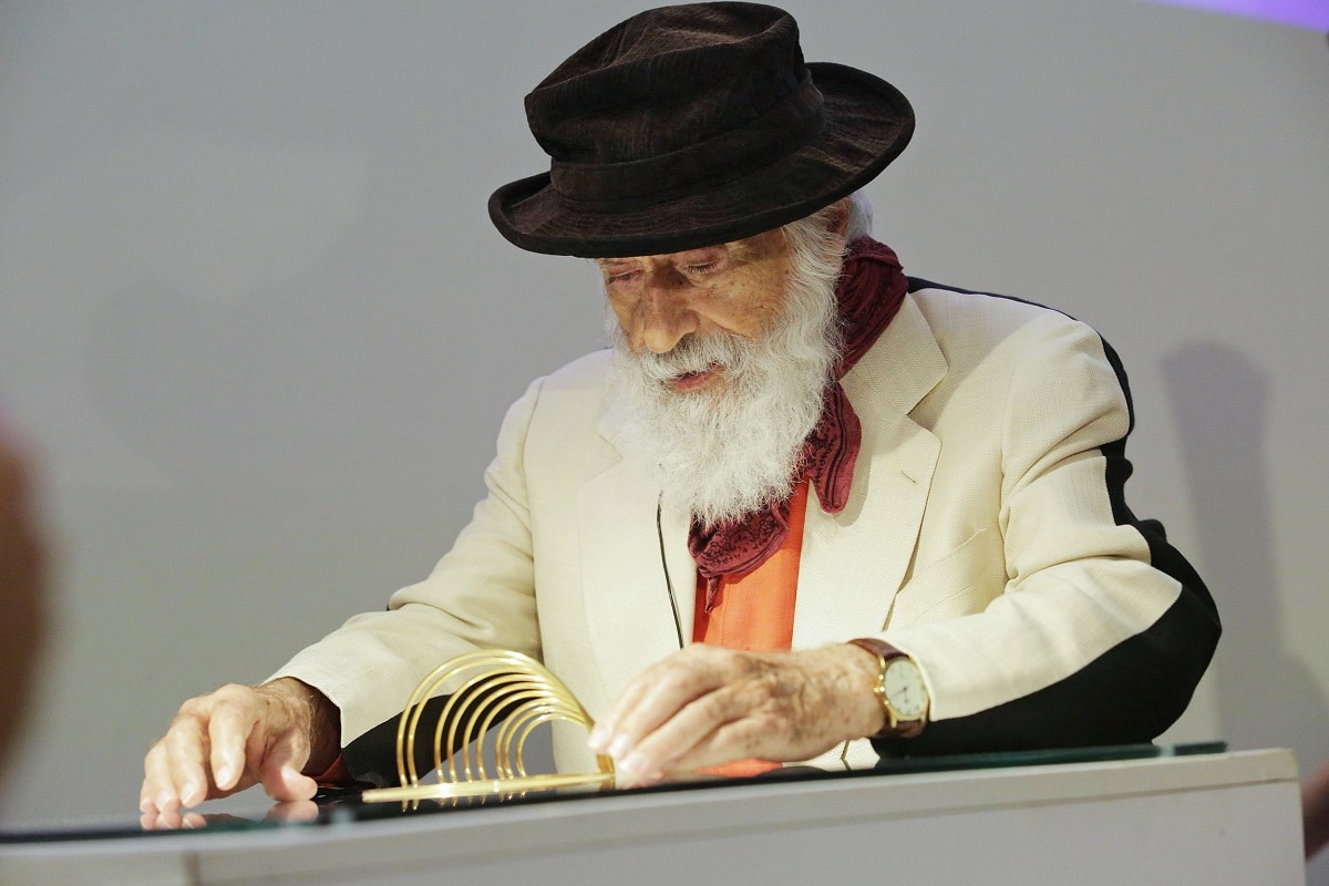 Yaacov Agam discusses art history with Park West Gallery VIP guests at the opening of the Yaacov Agam Museum of Art in Rishon LeZion, Israel.