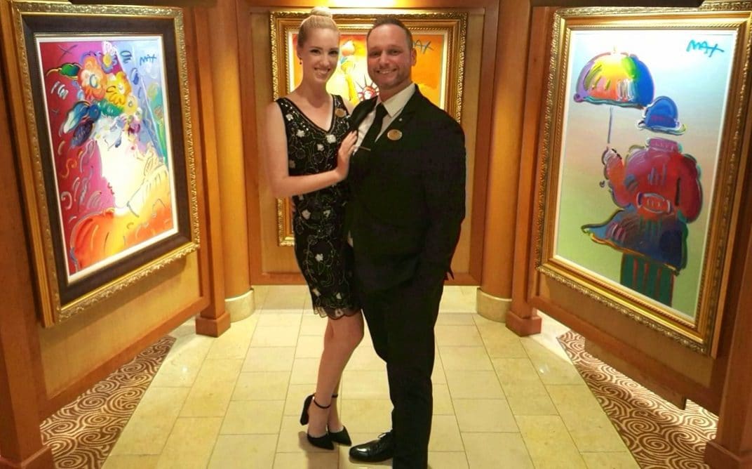 Auctioneer Spotlight: Ty and Gracie Braga, posing in one of Park West's onboard art galleries.