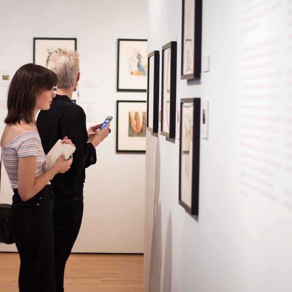 A patron browses "Salvador Dalí's Stairway to Heaven" at Louisiana’s Hilliard University Art Museum.