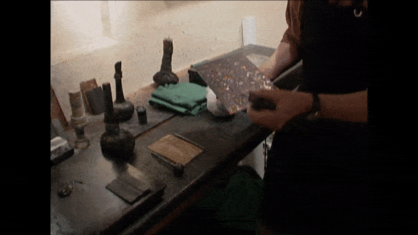 How Etchings Are Made: The artist scratches an image into the ground using a burin (needle), exposing the metal underneath.