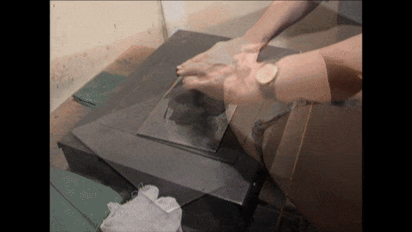 How Etchings Are Made: The plate is inked. Ink fills the lines on the plate created by the acid.