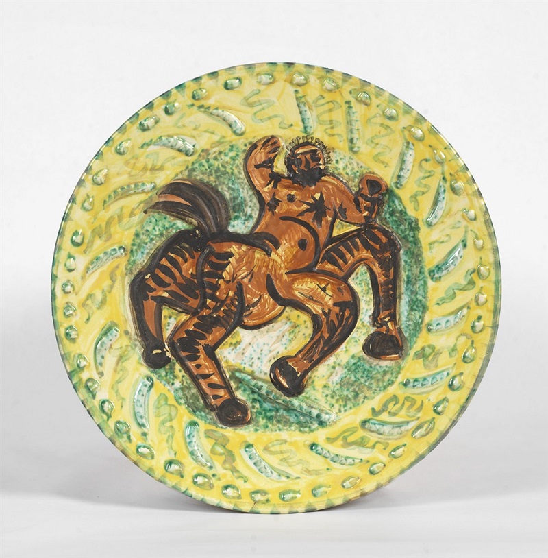 "Centaure" (Centaur, 1956), Pablo Picasso. White earthenware clay round dish with colored engobe and partially brushed glazed. From the Picasso Ceramics collection at Park West Gallery.