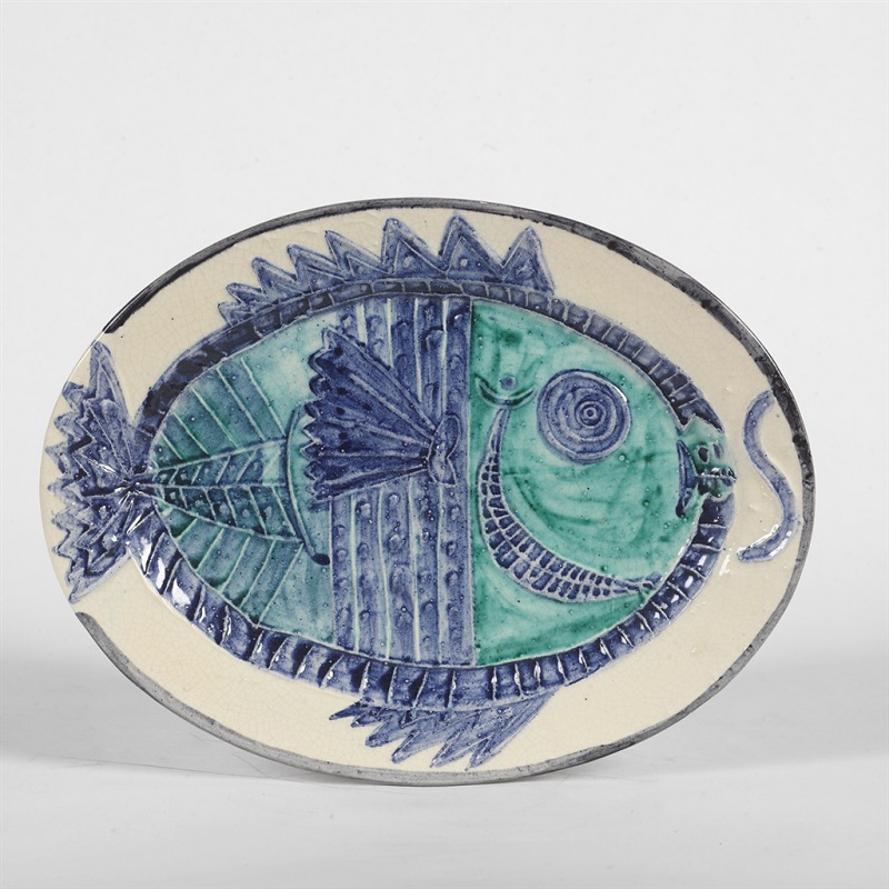 "Poisson de Profil" (Fish in Profile; 1951), Pablo Picasso. White earthenware clay oval dish with colored engobe and glaze. From the Picasso Ceramics collection at Park West Gallery.