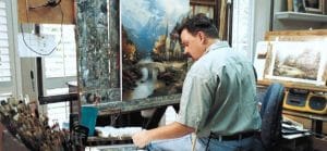 Thomas Kinkade at work in his studio.