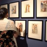 Patrons browse Dalí’s illustrations at the "Stairway to Heaven" opening at the Oglethorpe University Museum of Art.