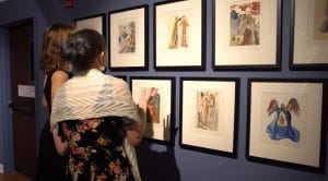 Patrons browse Dalí’s illustrations at the "Stairway to Heaven" opening at the Oglethorpe University Museum of Art.