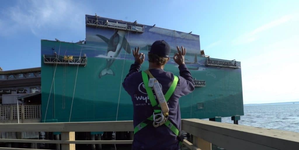 Wyland approves of his 101st Whaling Wall mural.