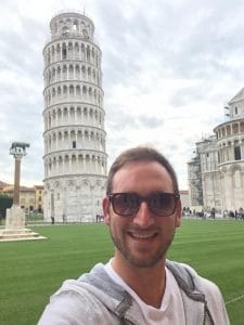 Henry-John enjoying the Leaning Tower of Pisa during his travels as an auctioneer.