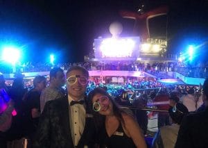 Auctioneers Matty and Sasha celebrate New Year's Eve on Carnival Valor