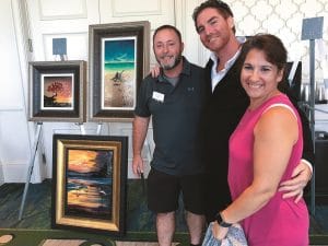 Beyrer poses with Park West collectors during an event in Orlando, Florida.