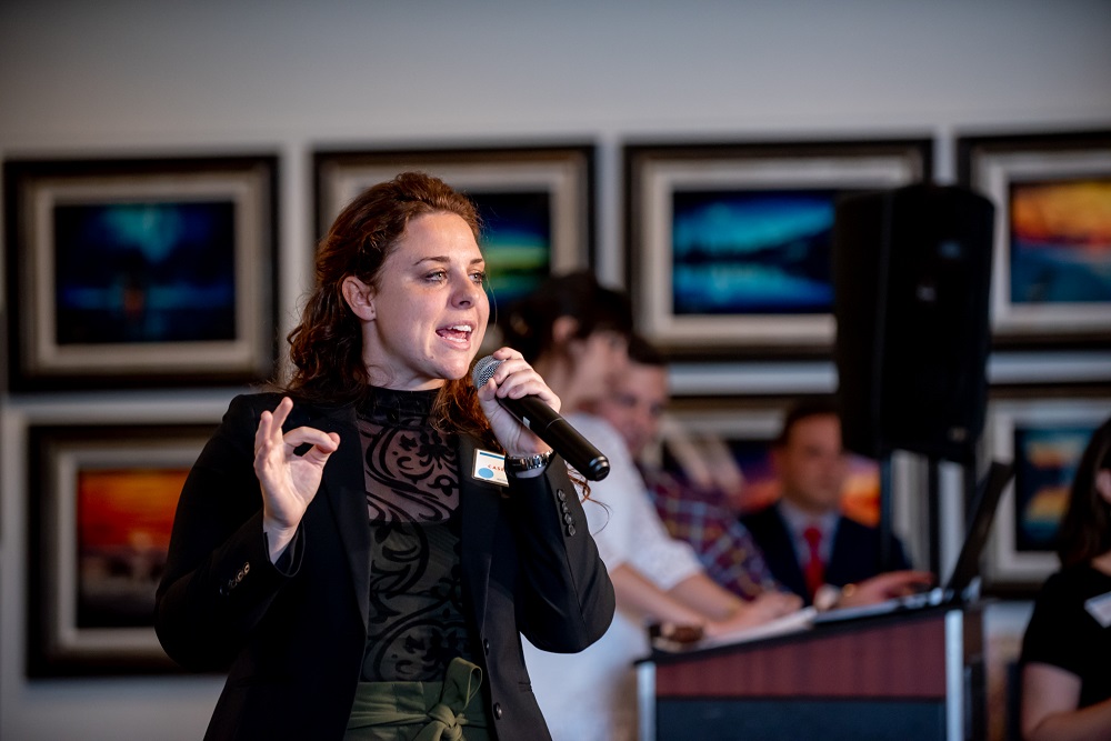 Gandy showing off her auctioneer skills on stage