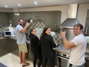 Members of the London 5 cleaning up at their rental house.