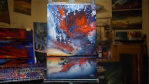 Ashton Howard painting sits on an easel in this new video.