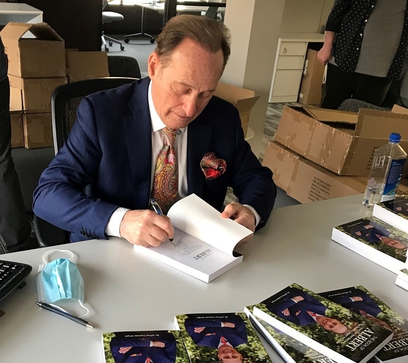 Albert Scaglione signs copies of his new book "The Book of Albert: How Park West Became the World's Largest Art Dealer."