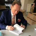 Albert Scaglione signing copies of "The Book of Albert" at the Park West Foundation in Michigan.