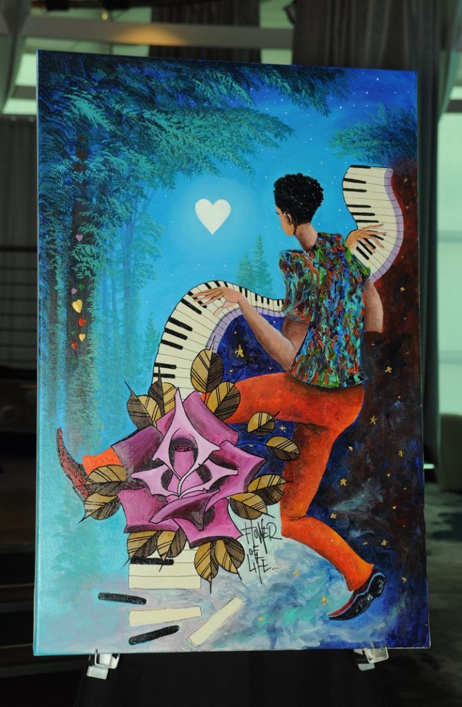 "Love in Triple Time" is a collaborative painting created by Kre8, Marcus Glenn, and Jon Rattenbury.