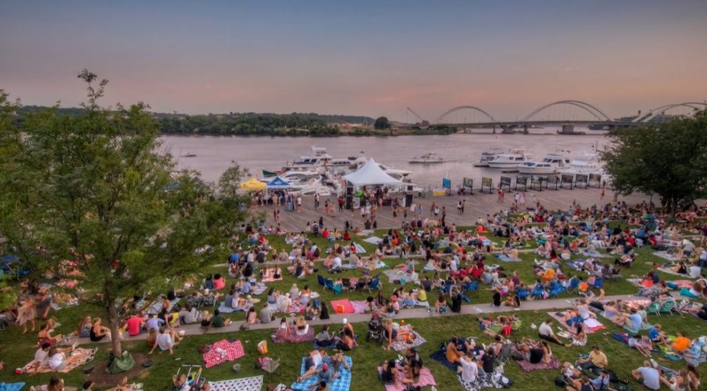 Spectators flock to the DC waterfront for the annual Cherry Blossom Festival and Petalpalooza. (Image from 2021 Petalpalooza. Credit: National Cherry Blossom Festival)