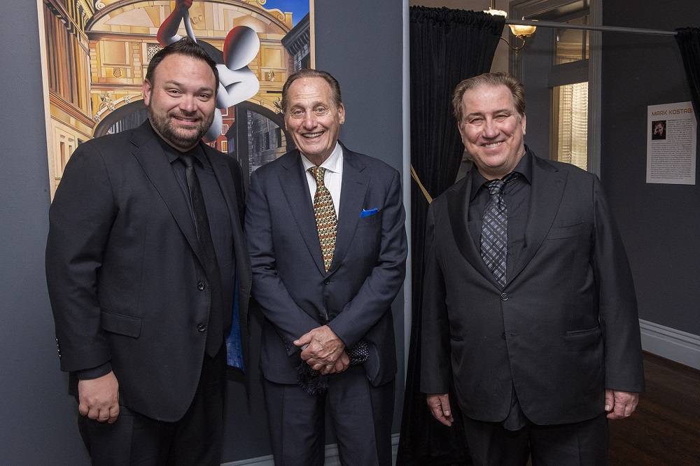 Park West Gallery’s Executive Vice President John Block, Park West Founder and CEO Albert Scaglione, and artist Mark Kostabi at the opening for “Provocateur & Healer”