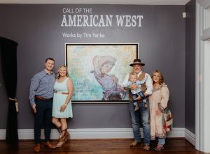 (Left to right): Tim's son Roman, daughter-in-law Lucie, Tim holding his grandson Rhyland, and Tim's wife Nicky Yanke