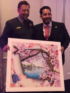 A special print of Orlando's painting was presented to the National Park Service to hang in their regional office.