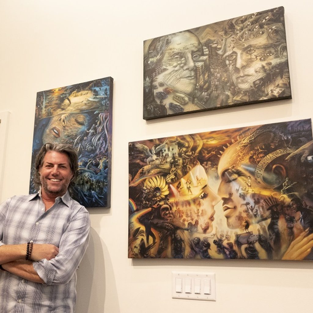 Made in Vegas winner Chris Elliman poses with his artwork at Park West Vegas